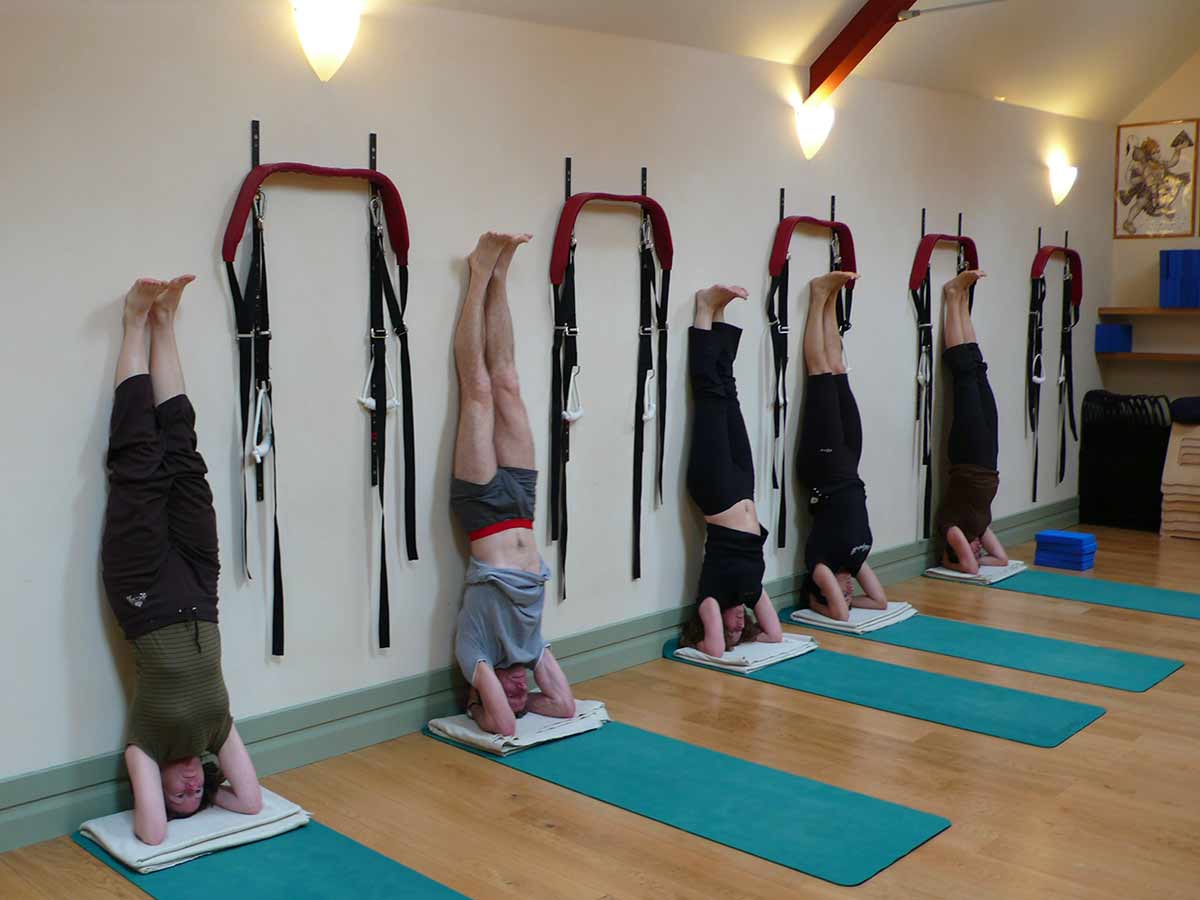 Centered Yoga Students practising Sirsasana
