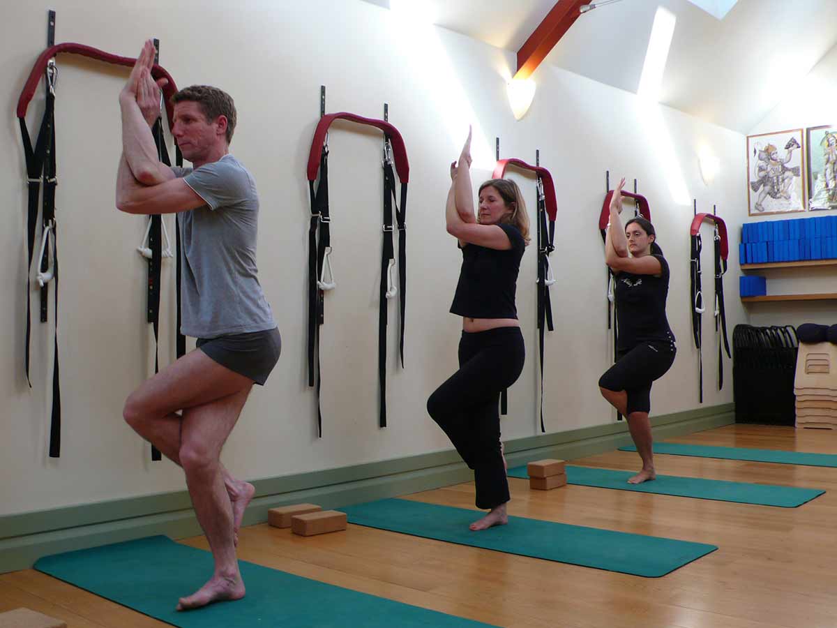 Centered Yoga Students practising Garudasana